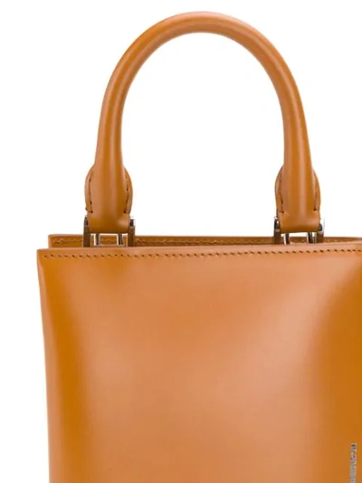 Shop Jil Sander Clutch Shoulder Bag In Brown