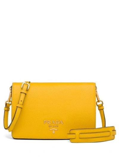 Shop Prada Logo Plaque Shoulder Bag In Yellow