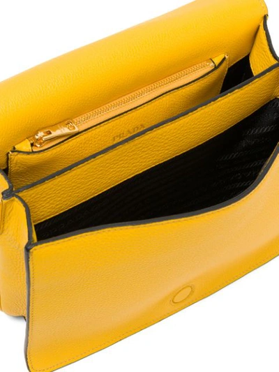 Shop Prada Logo Plaque Shoulder Bag In Yellow