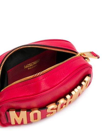 Shop Moschino Oversized Logo Belt Bag In Red