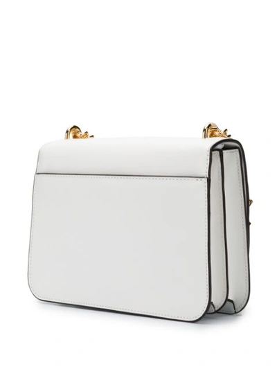 Shop Michael Michael Kors Mott Butterfly Bag In White