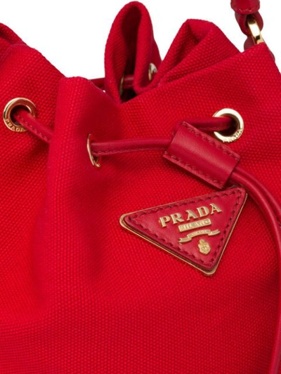 Shop Prada Straw Bucket Bag In Red