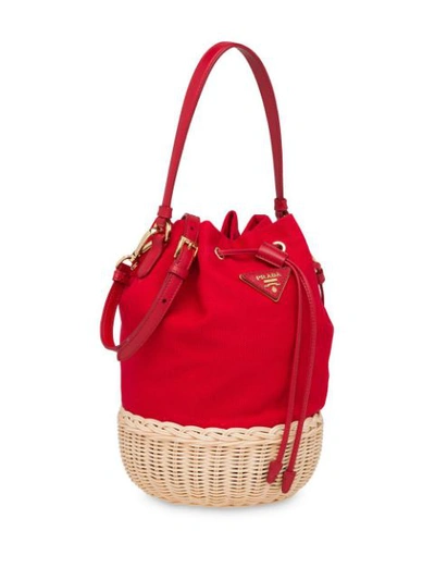 Shop Prada Straw Bucket Bag In Red