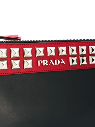 Shop Prada Studded Clutch In Black