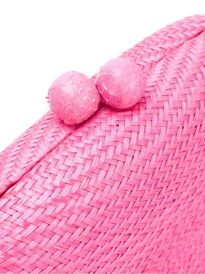Shop Serpui Straw Clutch In Pink