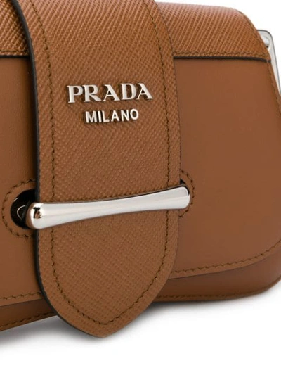 Shop Prada Sidonie Crossbody Bag In Brown