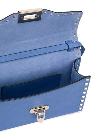 Shop Valentino Garavani Small Rockstud Crossbody Bag In Blue