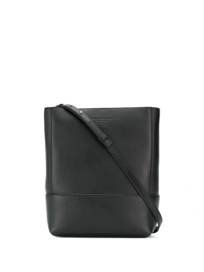Shop Bottega Veneta Stamped Logo Shoulder Bag In Black