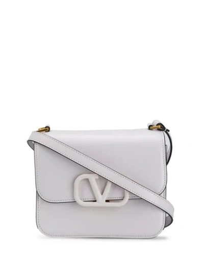 Shop Valentino Vsling Crossbody Bag In White