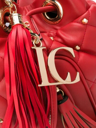 Shop La Carrie Diamond Quilt Bucket Bag In Red