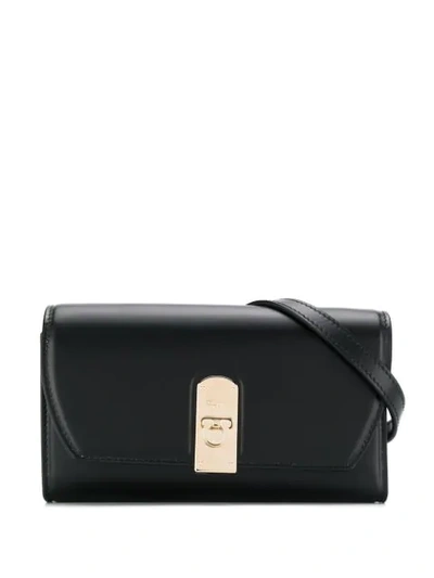 Shop Ferragamo Flap-front Belt Bag In Black