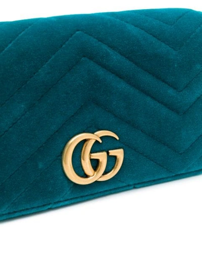 Shop Gucci Gg Marmont Chevron Clutch In Blue