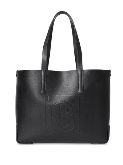 Shop Burberry Embossed Monogram Motif Leather Tote In Black