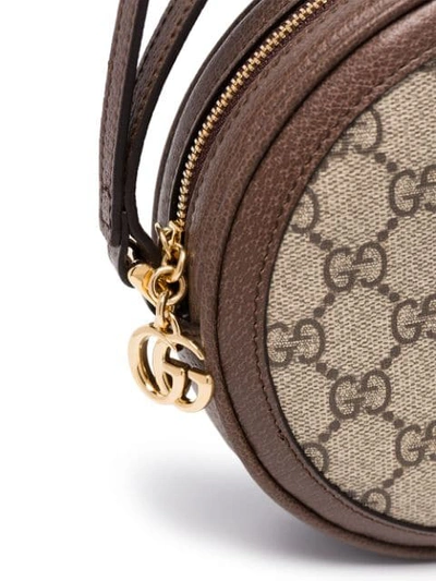 Shop Gucci Gg Supreme Round Clutch Bag In Brown