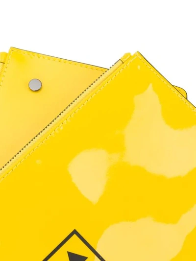 Shop Off-white Arrow Print Clutch In Yellow