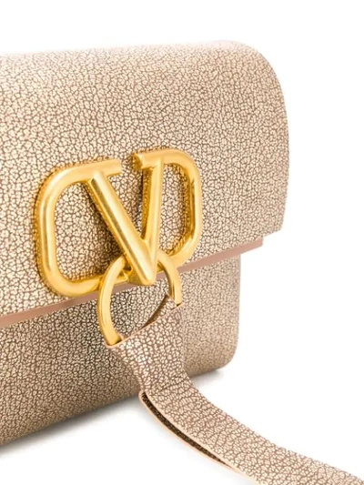 Shop Valentino Vring Crossbody Bag In Gold