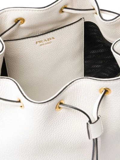 Shop Prada Logo Bucket Bag In White