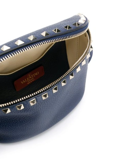 Shop Valentino Garavani Rockstud Belt Bag In Blue