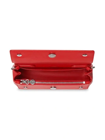 Shop Burberry Quote Print Crossbody Bag In Bright Military Red