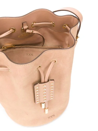Shop Tod's Studded Bucket Bag In S812 Stone