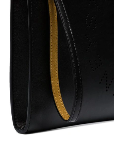 Shop Stella Mccartney Black Perforated Logo Faux Leather Clutch Bag