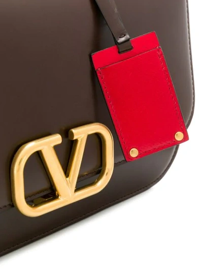 Shop Valentino Garavani Vring Shoulder Bag In Brown