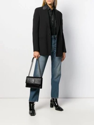 Shop Saint Laurent Sunset Stud-embellished Shoulder Bag In Black
