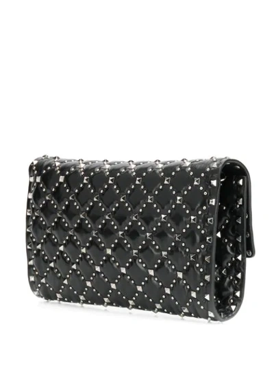 Shop Valentino Rockstud Spike Crossbody Bag In Black