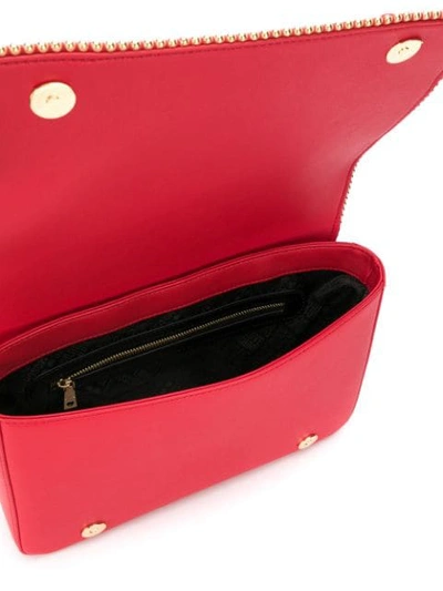 Shop Love Moschino Studded Shoulder Bag In Red