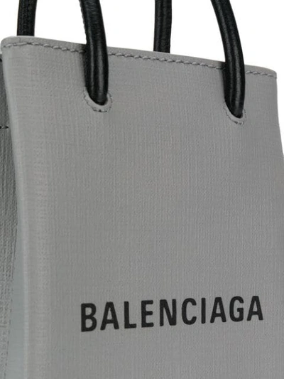 Shop Balenciaga Shopping Phone Bag On Strap In Grey