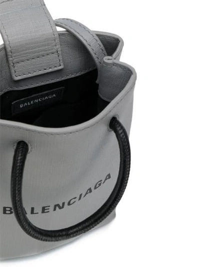 Shop Balenciaga Shopping Phone Bag On Strap In Grey
