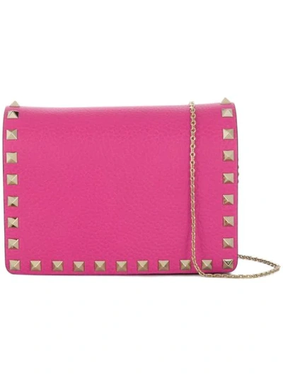 Shop Valentino Mini  Garavani Rockstud Crossbody Bag - Pink