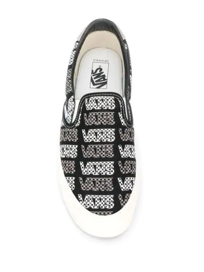 Shop Vans Slip-on Sneakers In Black