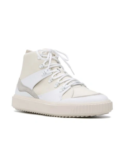 Shop Puma Breaker Mid Sneakers In White