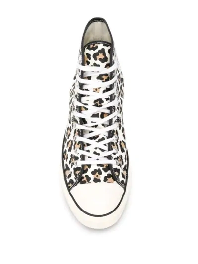 Shop Converse Leopard Print Chuck Taylor Sneakers In White