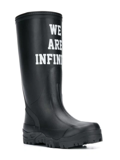 Shop Undercover Slogan Waterproof Boots In Black