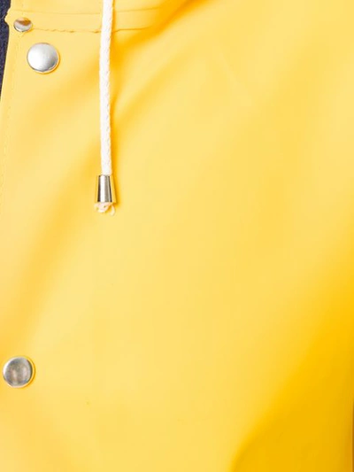 Shop Stutterheim Hooded Raincoat - Yellow