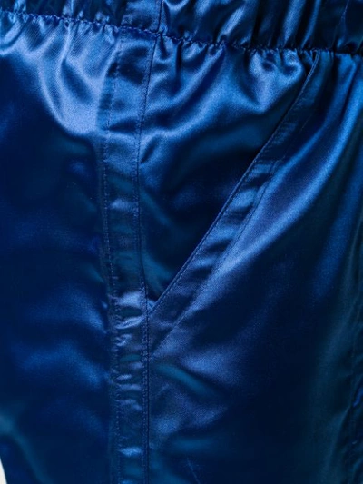 Shop Dima Leu Metallic Track Trousers In Blue