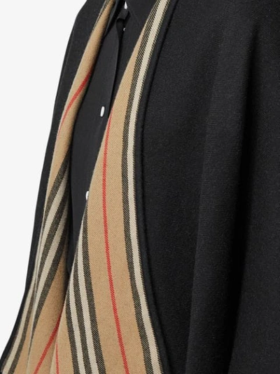 Shop Burberry Icon Stripe Detail Wool Cape In Black