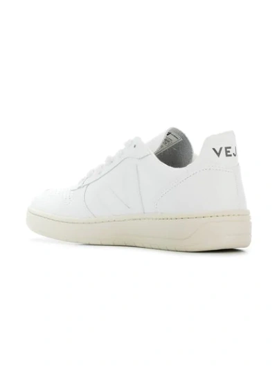 Shop Veja V-10 Perforated Sneakers In White