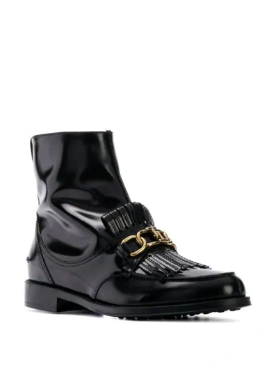 Shop Tod's Fringe Flap Ankle Boots In Black