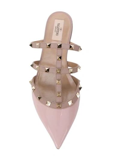 Shop Valentino Rockstud Slippers In Pink