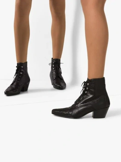 Shop Saint Laurent Susan Lace-up Ankle Boot In Black