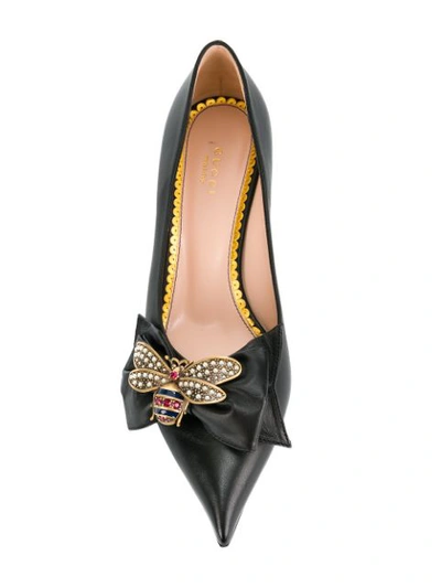 Shop Gucci Bow Embellished Pumps In Black