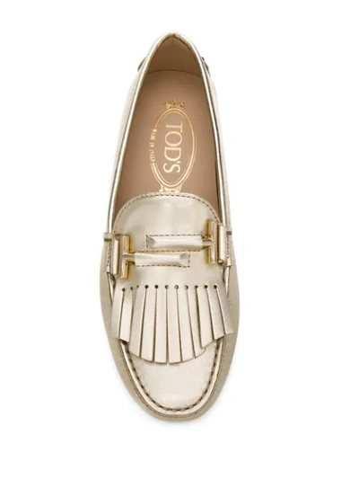 Shop Tod's Fringed Driving Loafers In Gold