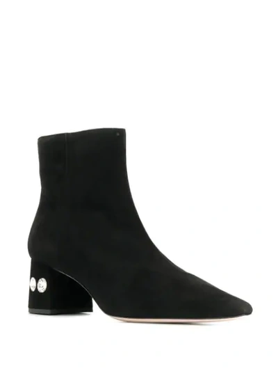 Shop Miu Miu Crystal Embellished Pointed Toe Ankle Boots In Black