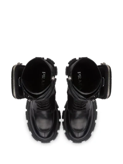 Prada Monolith Nylon Pocket-detailed Leather Combat Boots In Black