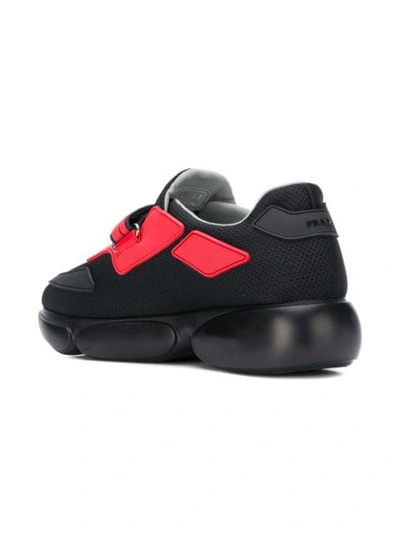 Shop Prada Cloudbust Sneakers In Black