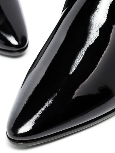 Shop Saint Laurent Jonas 25mm Ankle Boots In Black