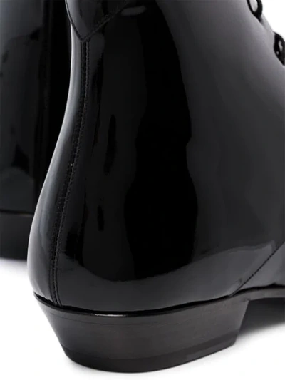 Shop Saint Laurent Jonas 25mm Ankle Boots In Black